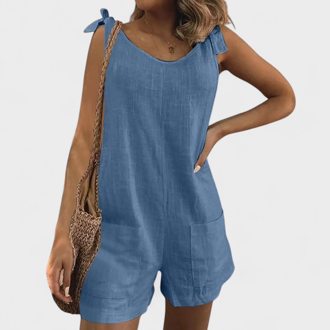 Yolanda | Jumpsuit su kišenėmis ant pečių ir kaspinu