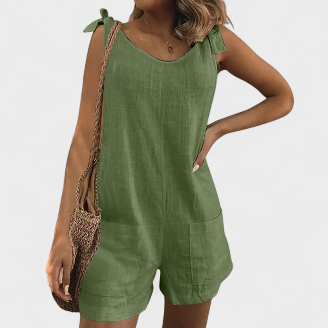 Yolanda | Jumpsuit su kišenėmis ant pečių ir kaspinu