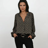 Beatriz | Elegantiška blusa su V formos iškirpte